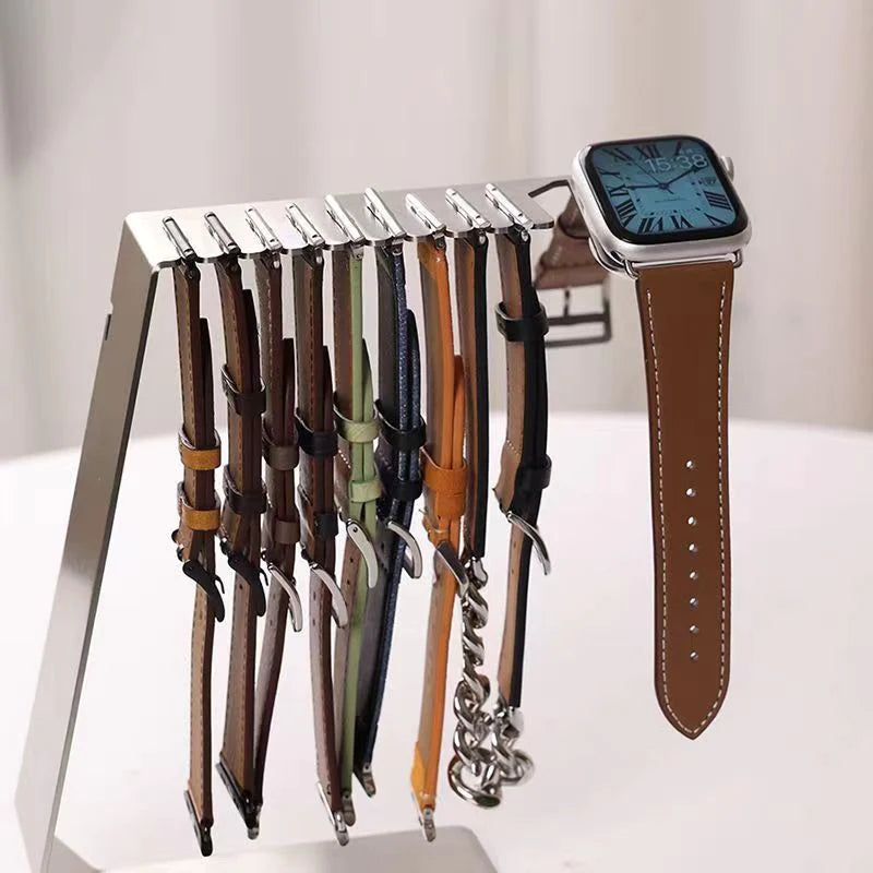 Watch strap storage bracket with charging base