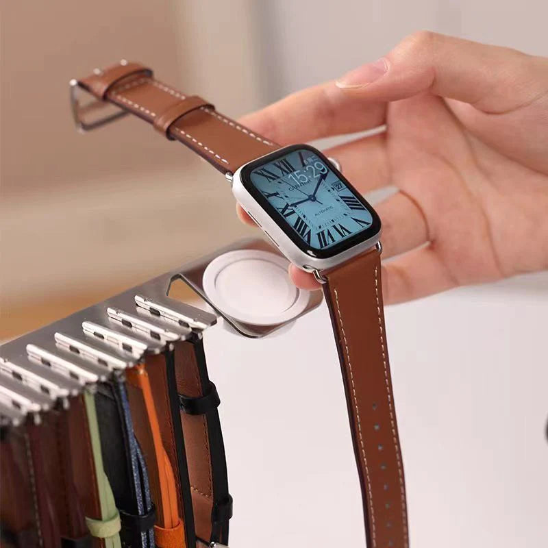 Watch strap storage bracket with charging base
